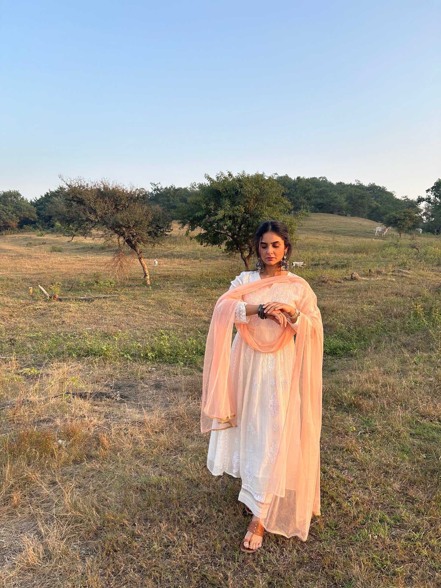 Elegant semi-stitched Chikankari kurta-dupatta set with intricate hand embroidery and Cutdana