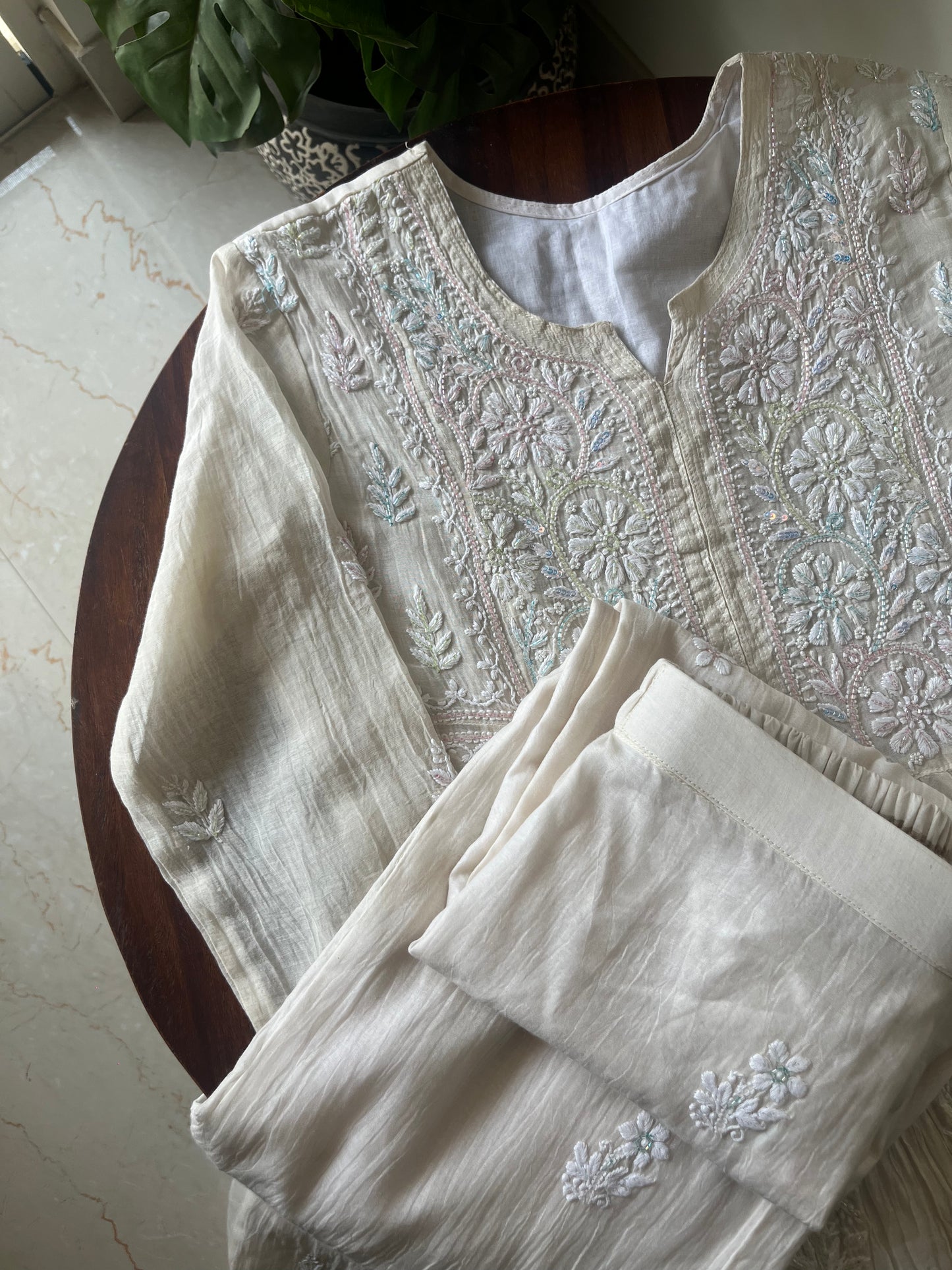 Elegant semi-stitched Chikankari kurta-dupatta set with intricate hand embroidery and Cutdana
