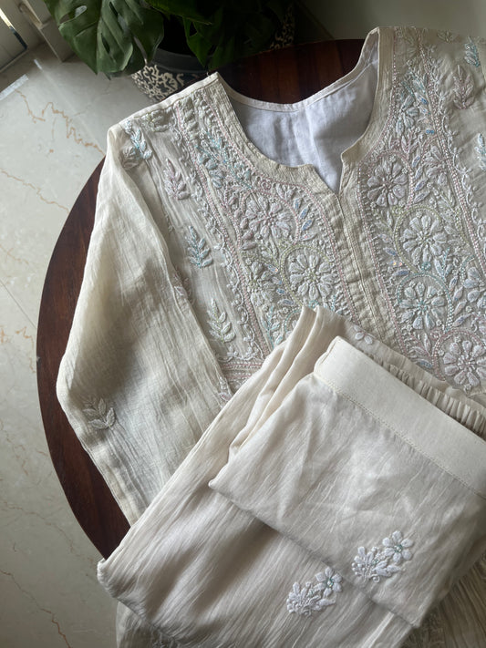Elegant semi-stitched Chikankari kurta-dupatta set with intricate hand embroidery and Cutdana